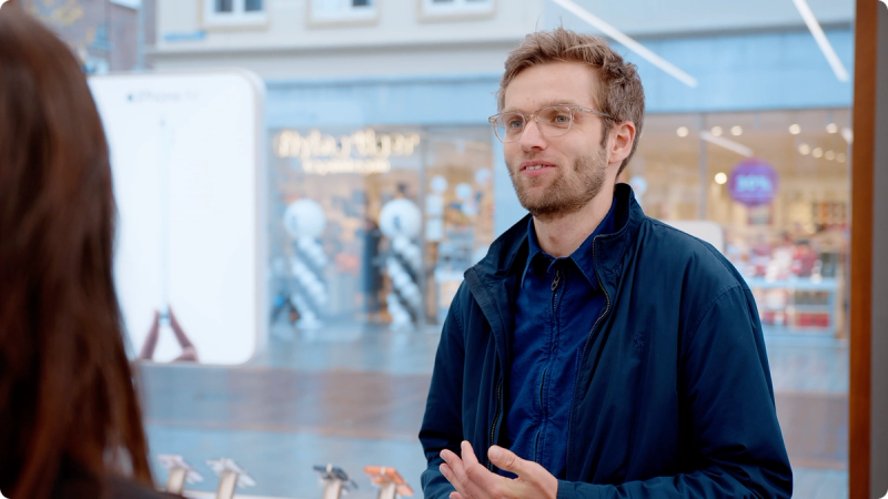 Store associate interacting with customer