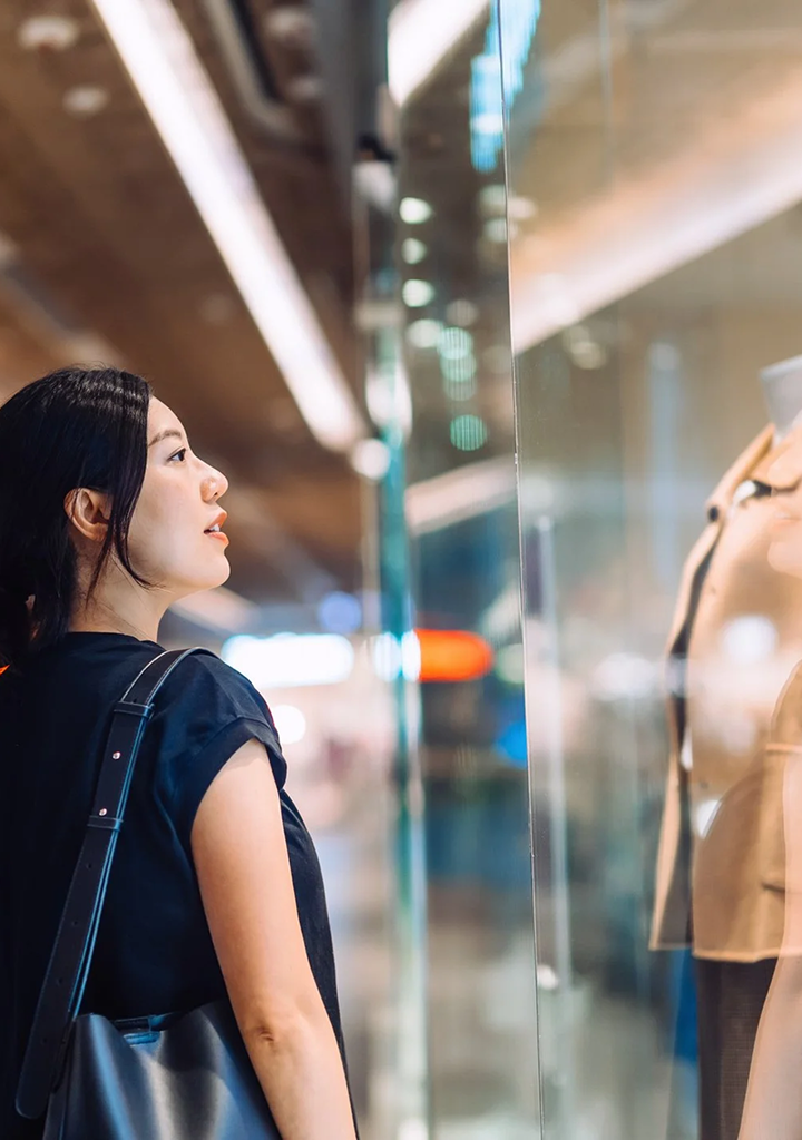 Person looking into a store