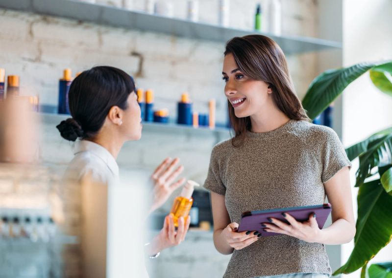 Store employee working with Streamline technology