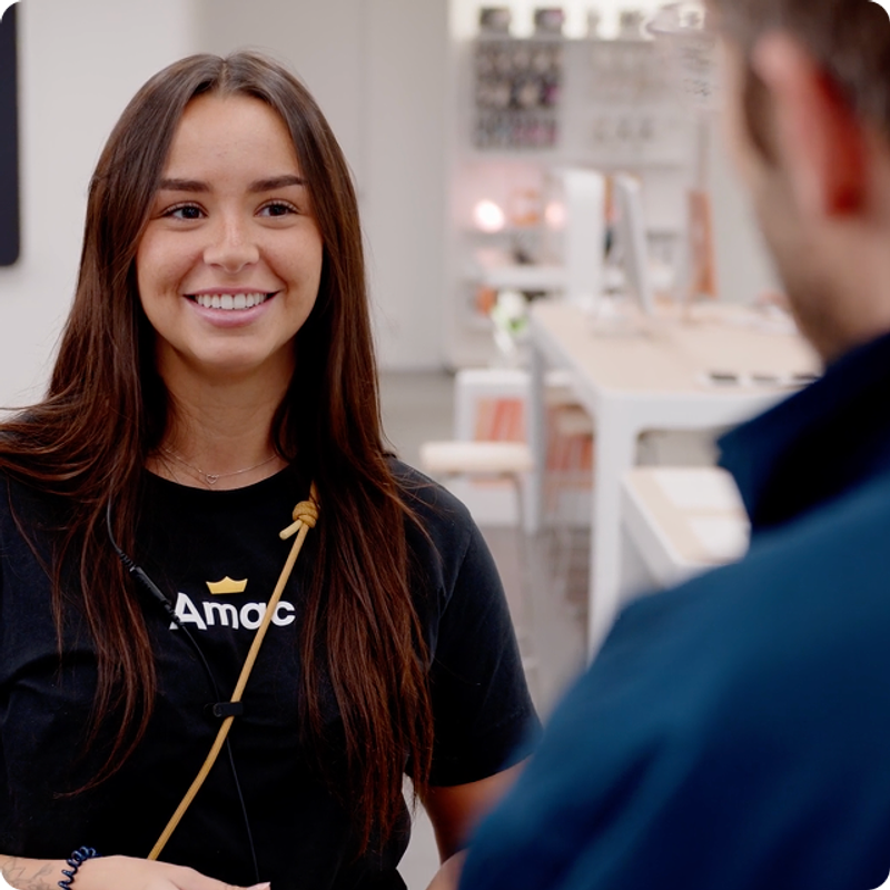 Store associate helping a customer