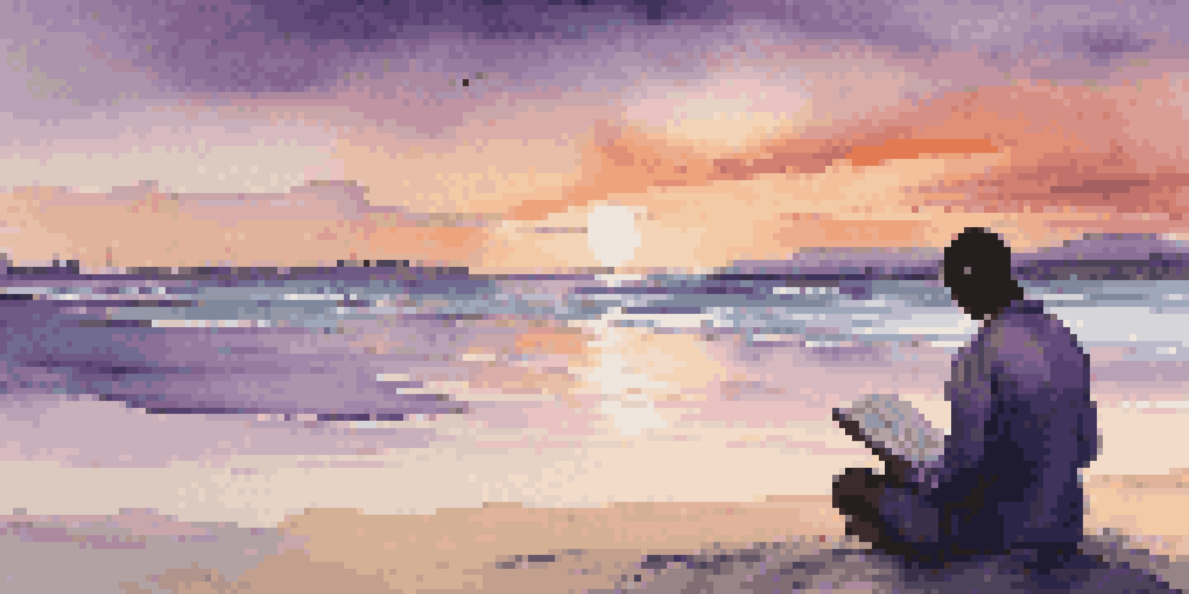 A person reading a book on a beach at sunset, with colorful skies and gentle waves.