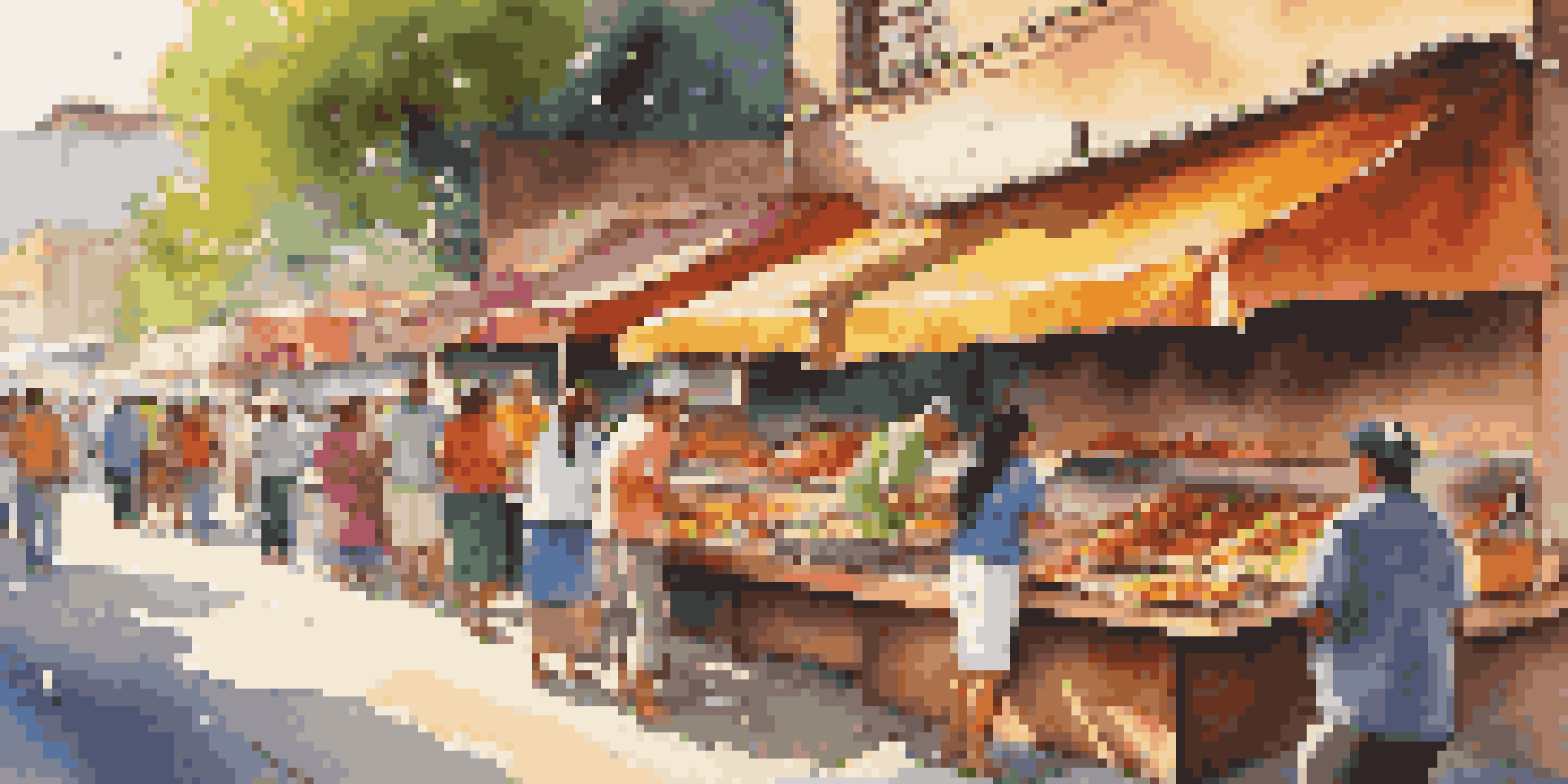 A busy street food market in Mexico with vendors preparing tacos and customers enjoying their meals under warm sunlight.