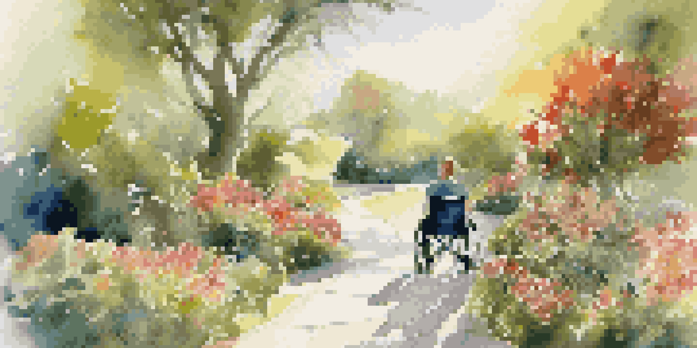 A person in a lightweight wheelchair enjoying a sunny day in a garden filled with colorful flowers and greenery.