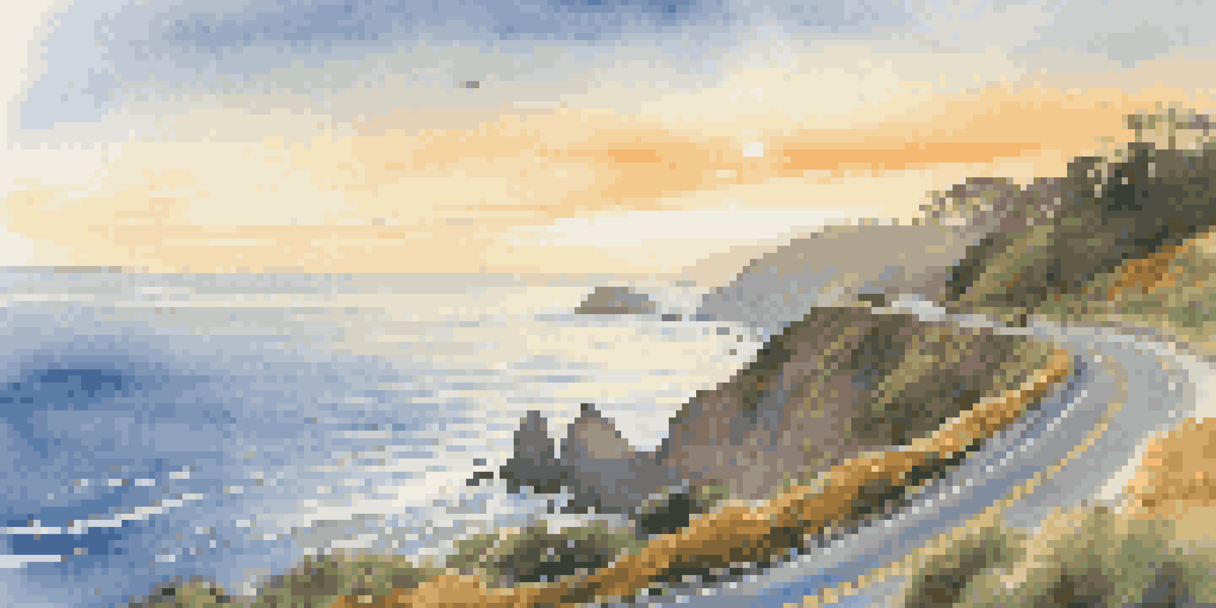 A scenic view of the Pacific Coast Highway with cliffs and ocean at sunset, featuring a vintage car on the road.