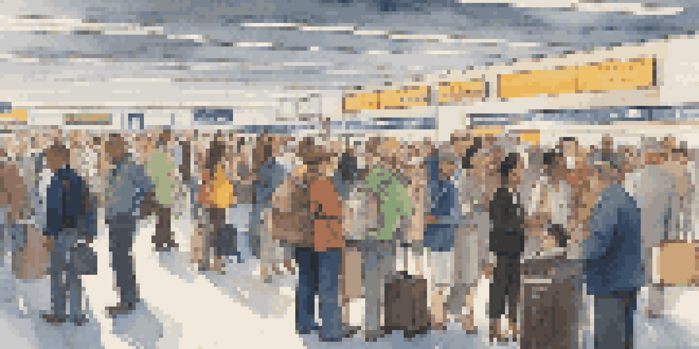 An airport customs area with travelers in line, displaying their passports to officers, showcasing a diverse crowd and bright lighting.