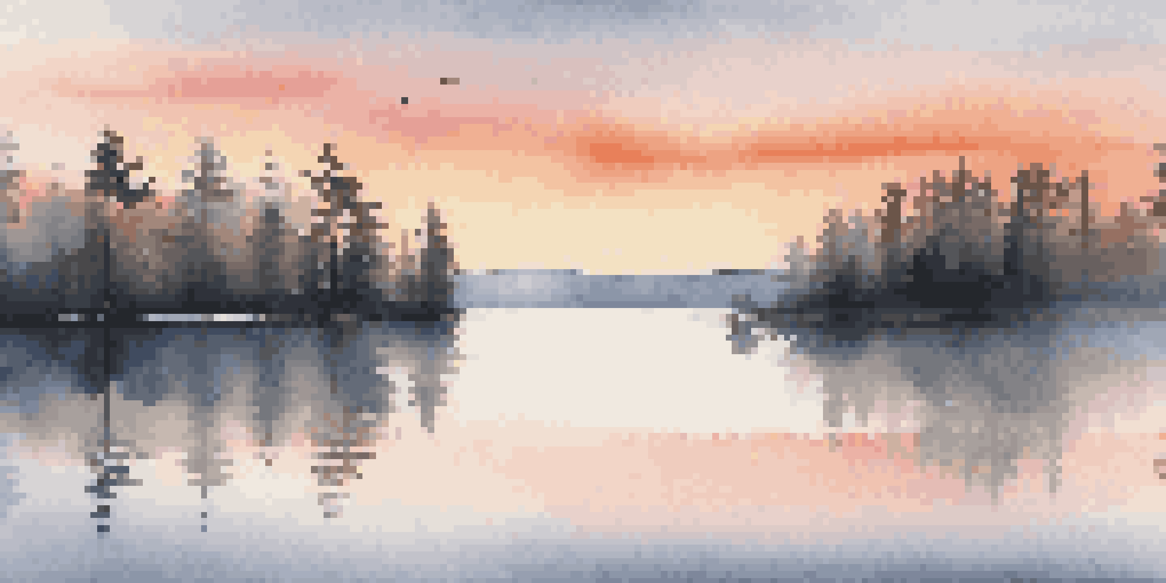 A beautiful sunrise landscape with a calm lake reflecting vibrant colors, framed by silhouettes of pine trees and mist rising from the water.