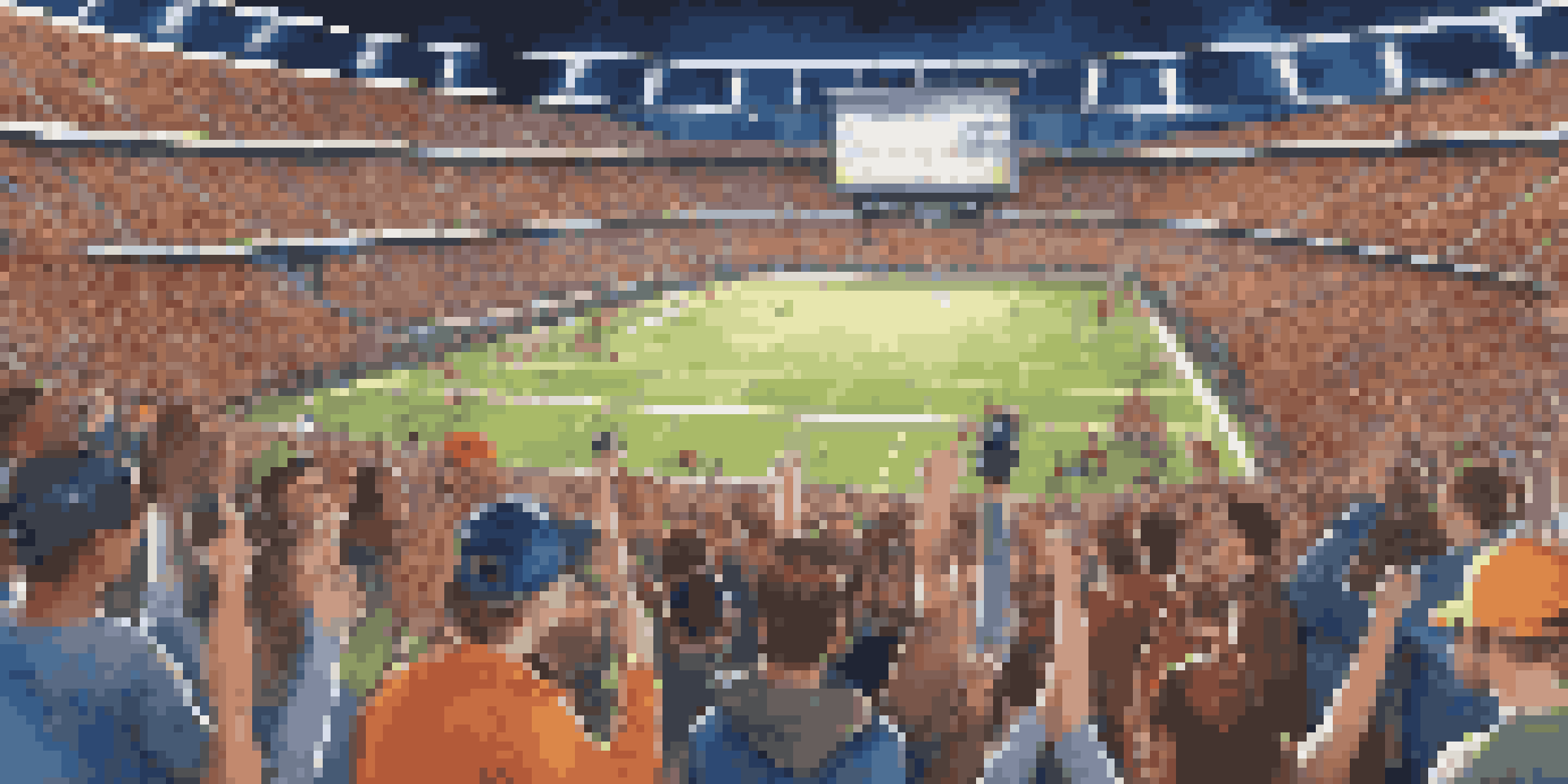 A crowded sports arena with fans cheering, colorful team banners, and a bright scoreboard. Friends are celebrating together in the foreground.