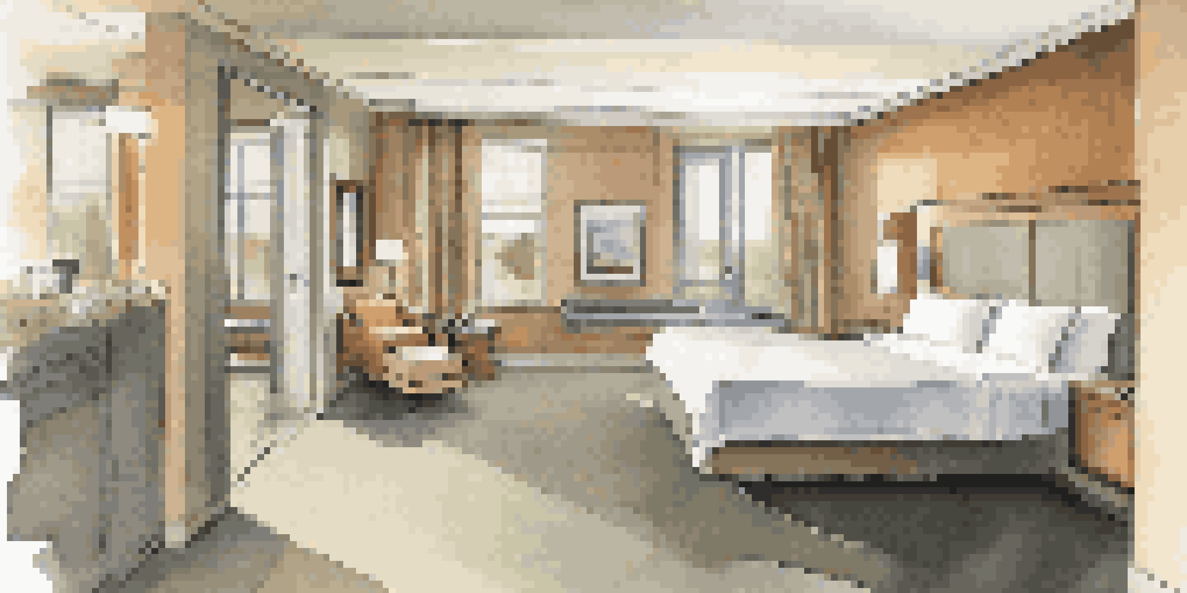 An accessible hotel room designed for comfort and mobility, showcasing wide doorways and a roll-in shower.