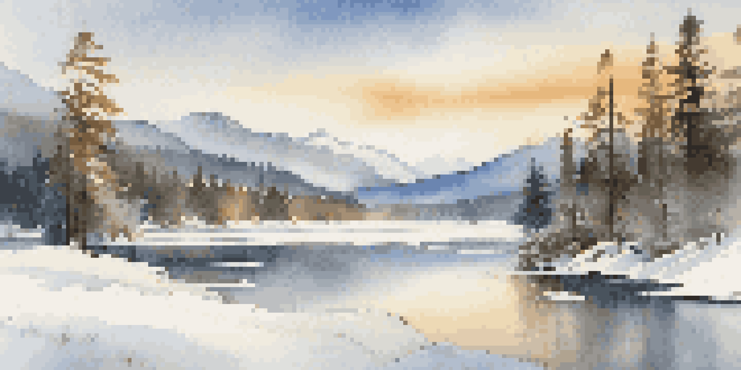 A tranquil winter scene with snow-covered trees and a frozen lake, set against majestic mountains and a clear blue sky.