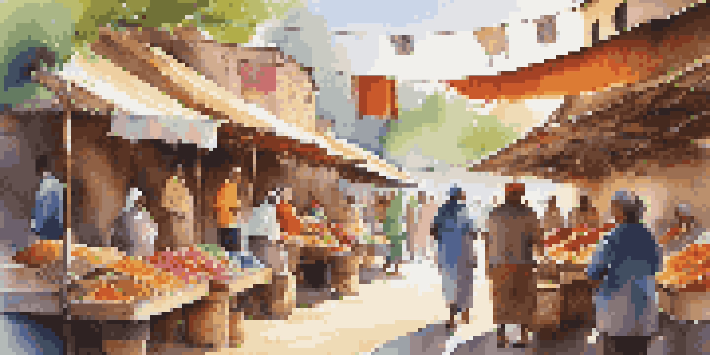 A bustling local market with artisans displaying colorful handcrafted goods and smiling shoppers in a sunny environment.