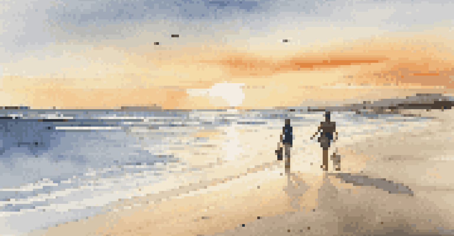A couple walking on a beach at sunset with waves and a colorful sky.