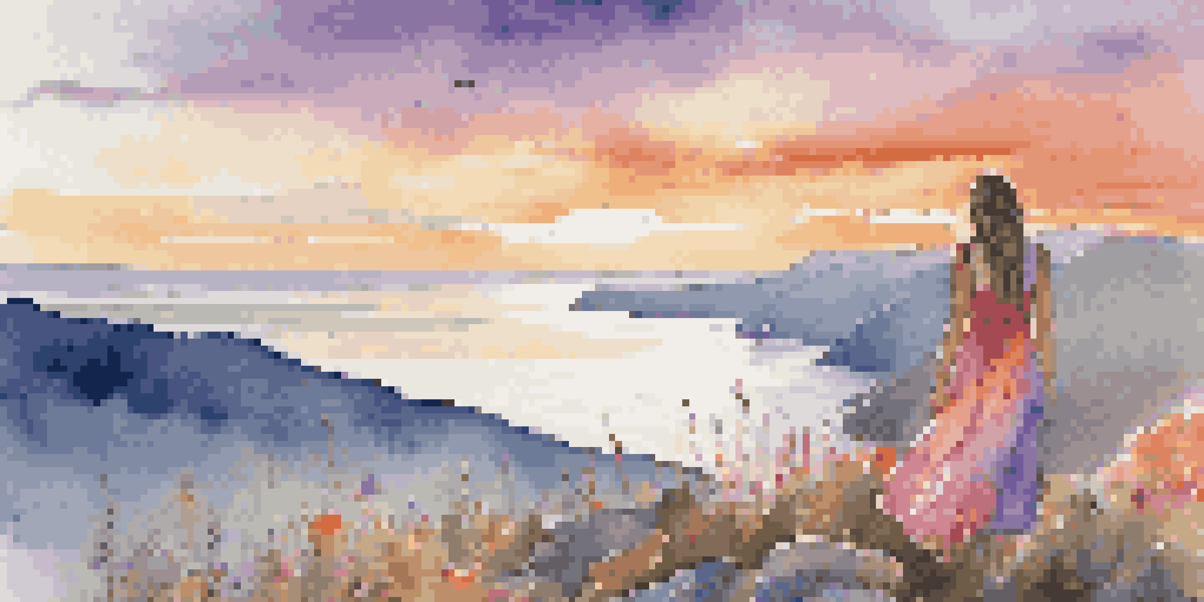 A solo female traveler on a cliff at sunset, with the ocean in the background and colorful wildflowers in the foreground.