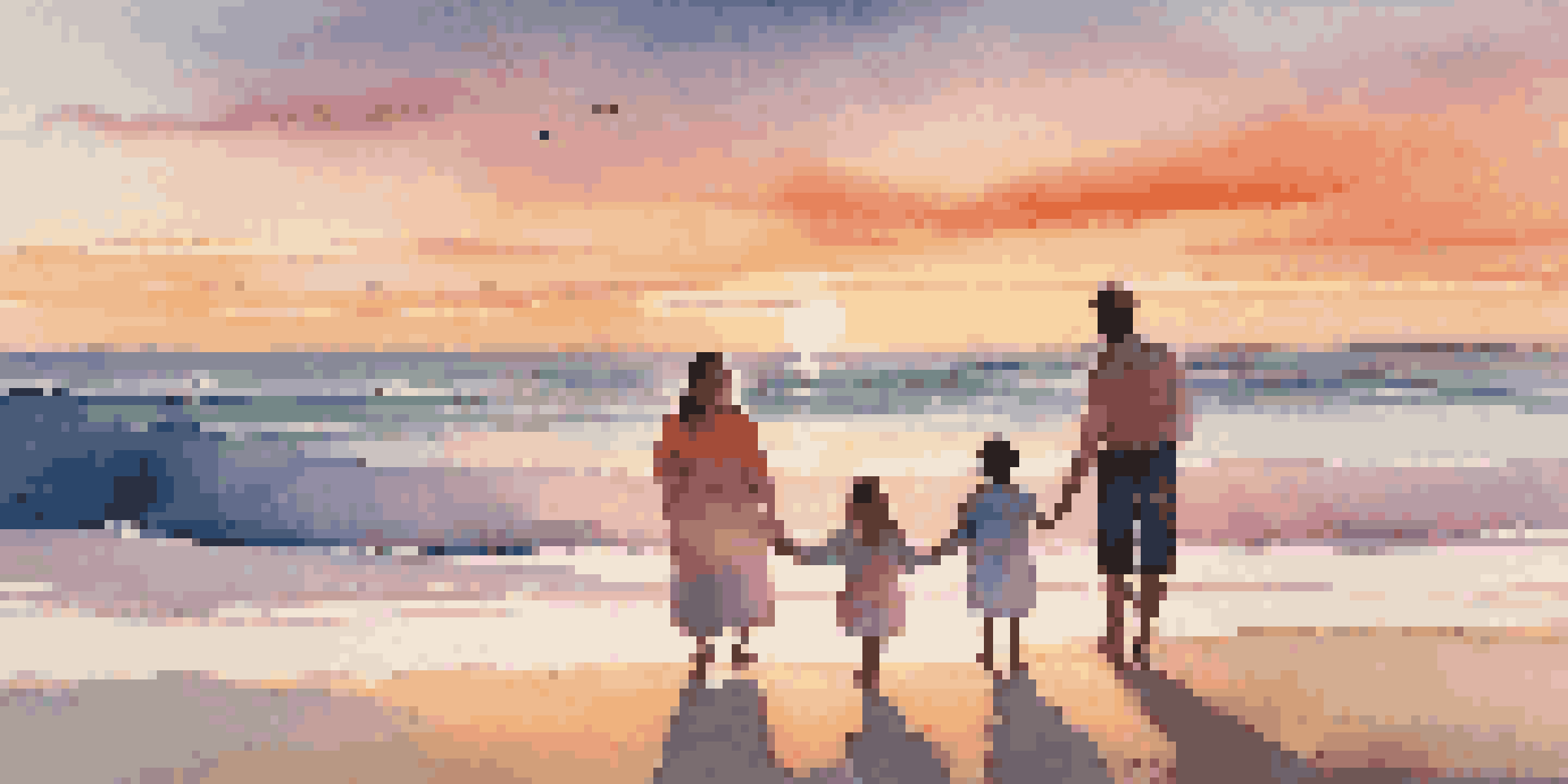 A joyful family of four on a beach at sunset, with parents holding hands with their children, all smiling and looking towards the ocean.