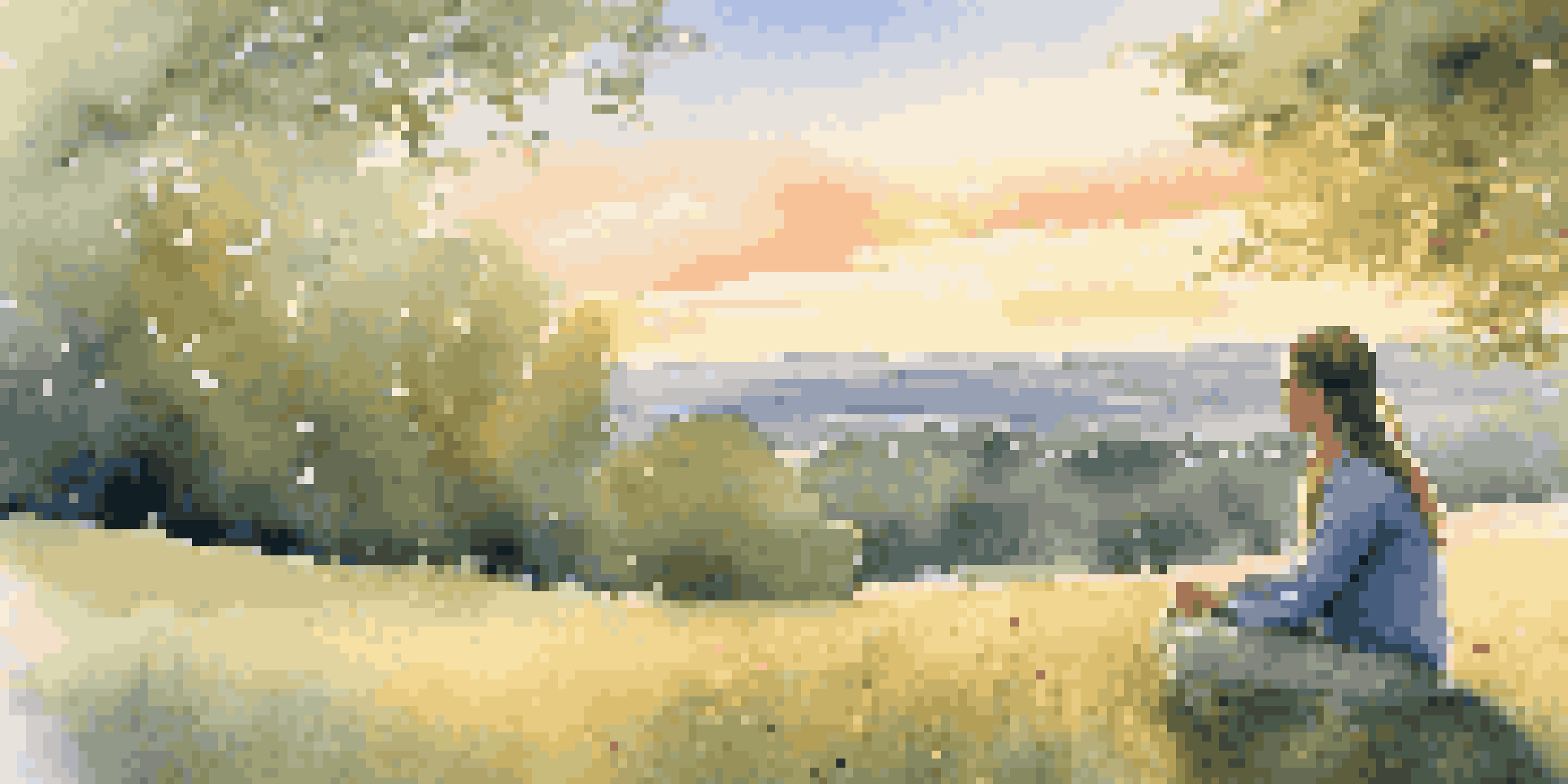 A woman practicing mindfulness outdoors, sitting cross-legged on a grassy hill surrounded by wildflowers during sunset.