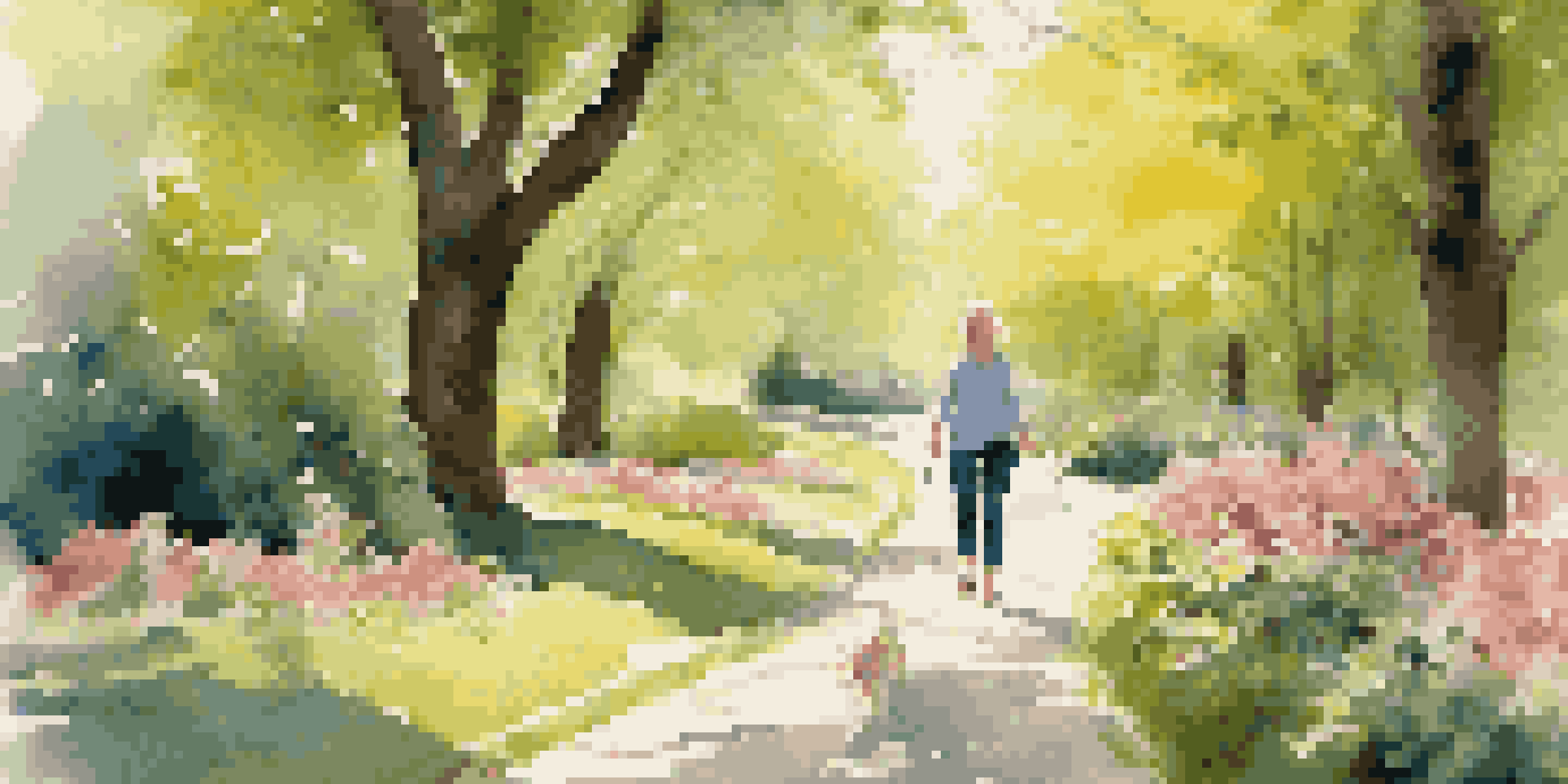 A dog and its owner walking on a path in a park filled with blooming flowers and trees, with sunlight filtering through the leaves.