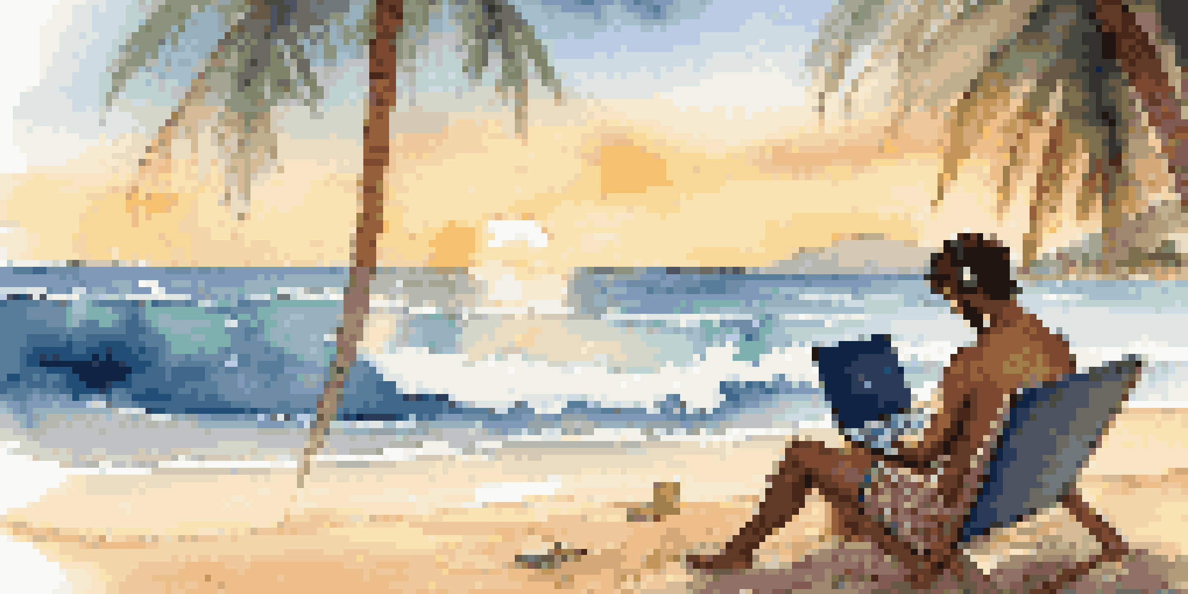 A digital nomad working on a laptop by the beach under a palm tree during sunset.