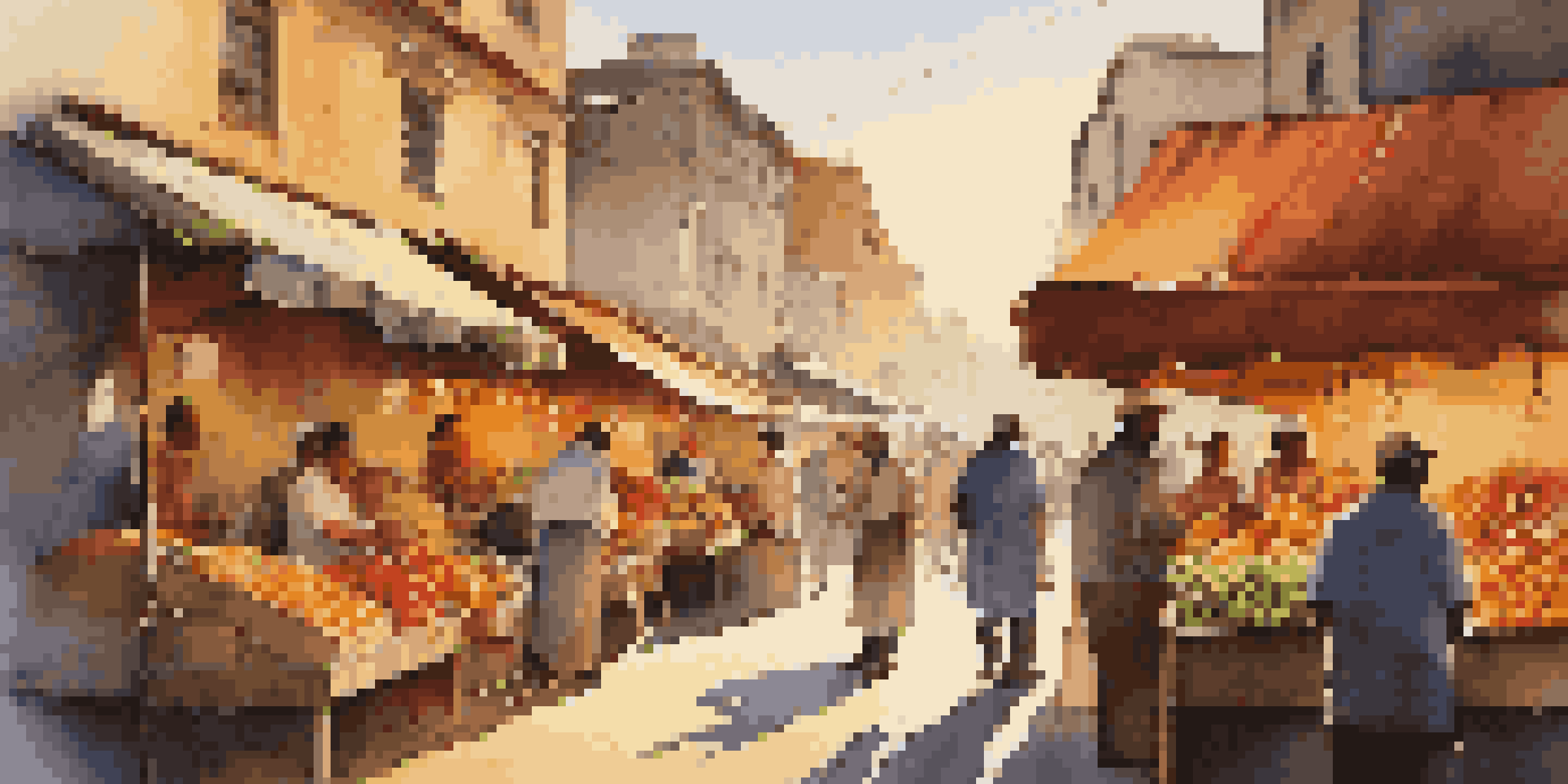 A bustling street market at sunset with colorful stalls of fruits and vegetables, people browsing and chatting in warm light.