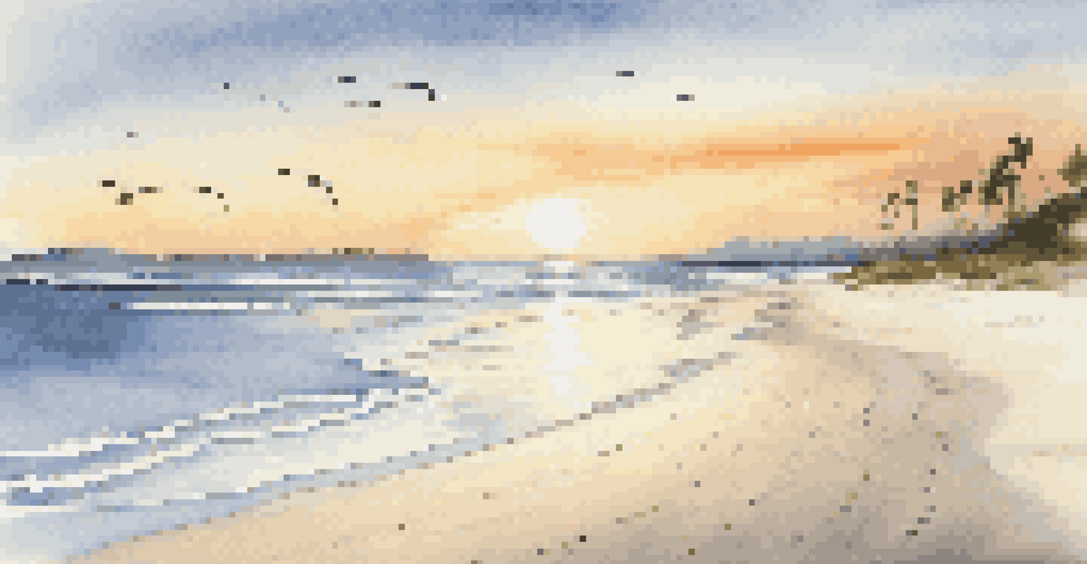 A tranquil beach at sunset with footprints in the sand and gentle waves in the background.