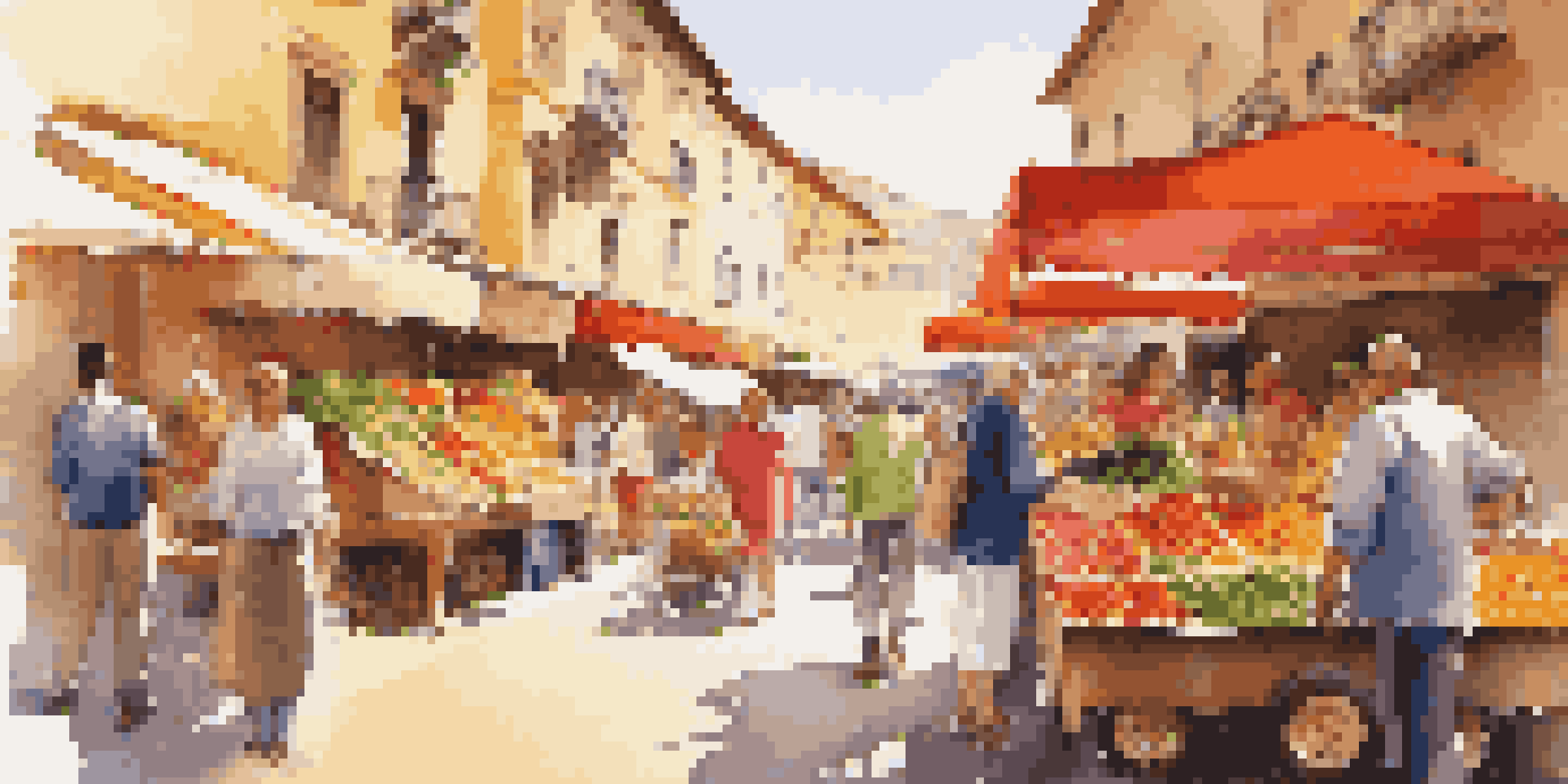 A bustling street market in Spain with colorful stalls and a traveler speaking with a local vendor.