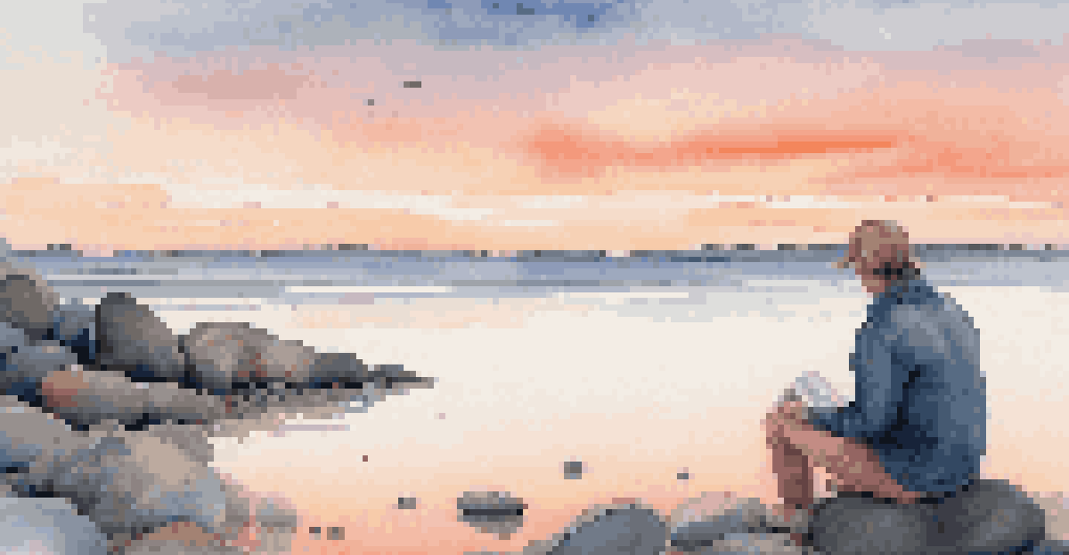 A traveler sitting on a rocky beach watching the sunset over the ocean.
