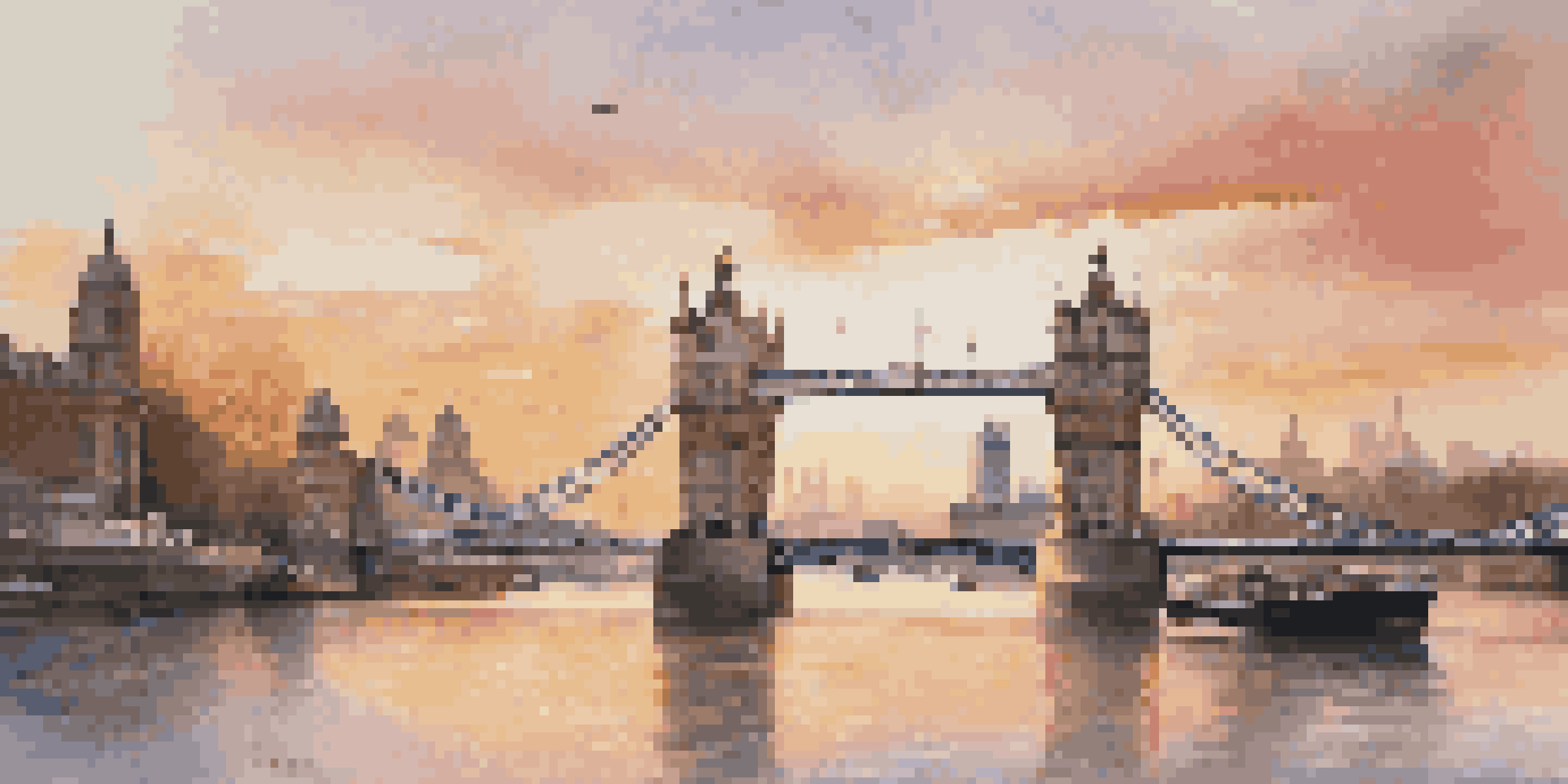 A scenic view of Tower Bridge at sunset, showcasing the bridge's architectural details and the river's reflections.