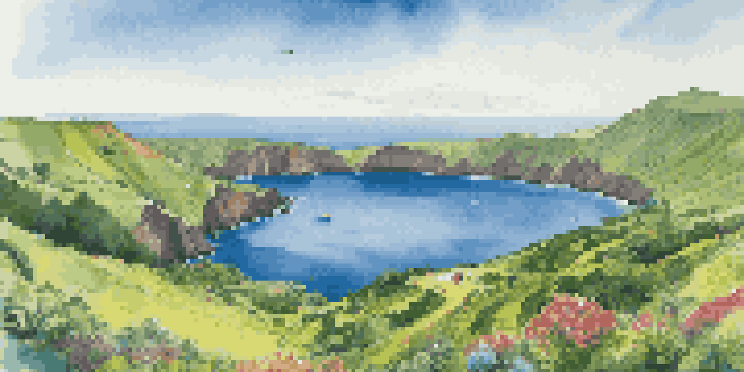 A beautiful scenic view of the Azores with green hills, volcanic craters, and a bright blue ocean, showcasing eco-conscious travelers on a whale watching tour.