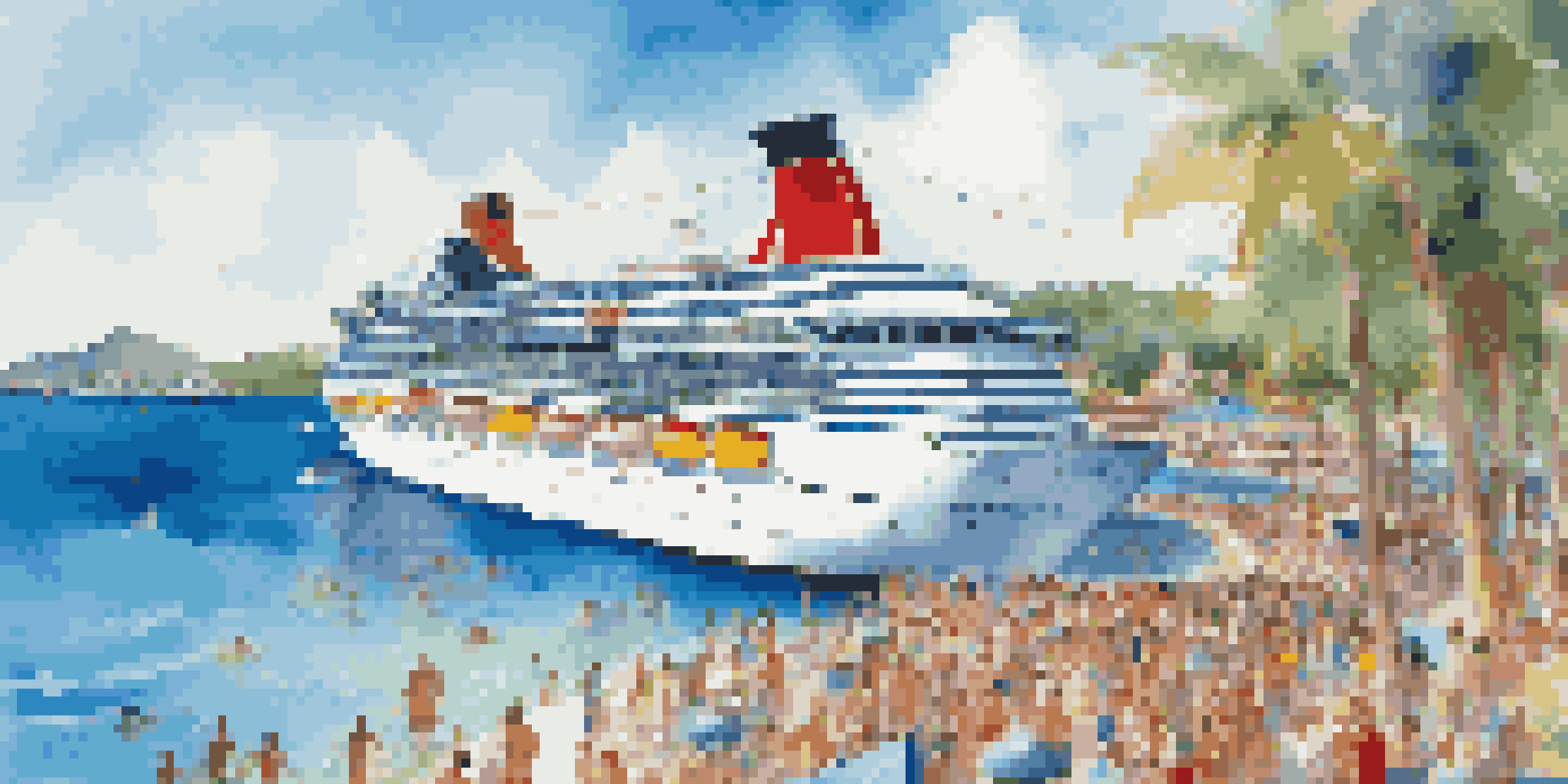 A colorful cruise ship on a sunny day in clear blue waters, with people enjoying various activities on deck.