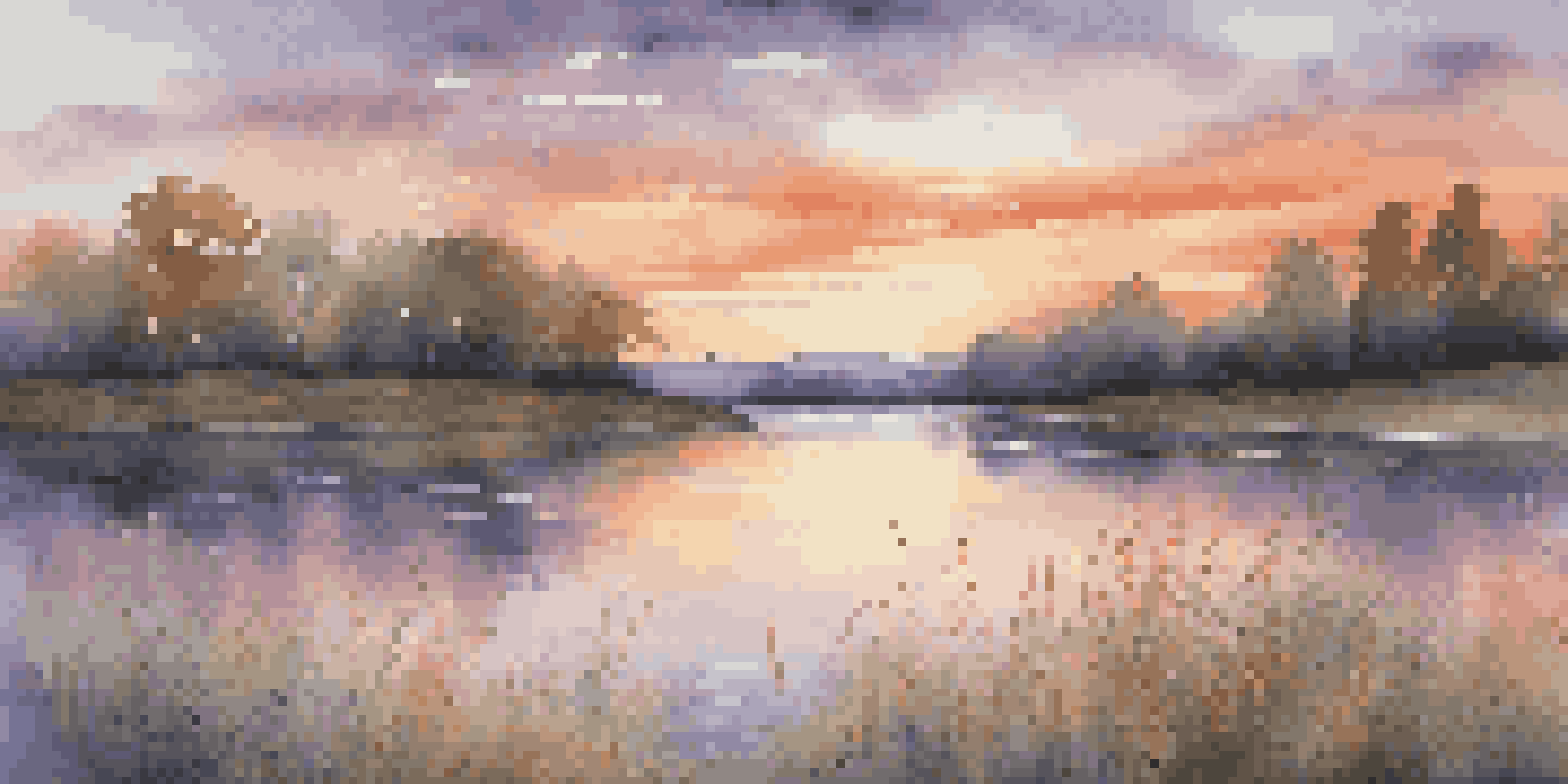 A tranquil lake at sunset with vibrant colors reflecting on the water, surrounded by blooming wildflowers.