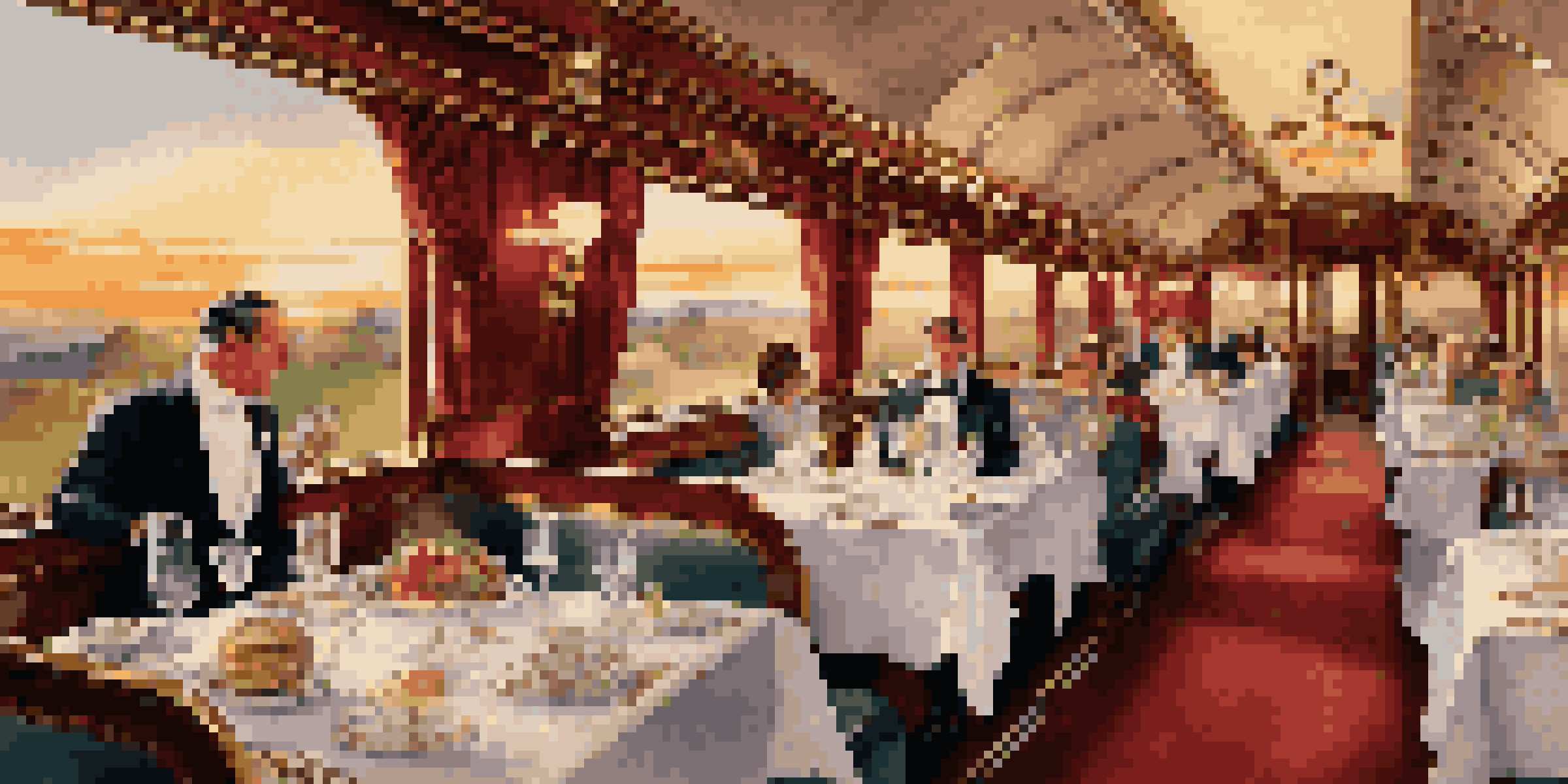 A luxurious dining car on a vintage train with elegantly set tables and passengers enjoying gourmet meals against a backdrop of scenic hills and a sunset.
