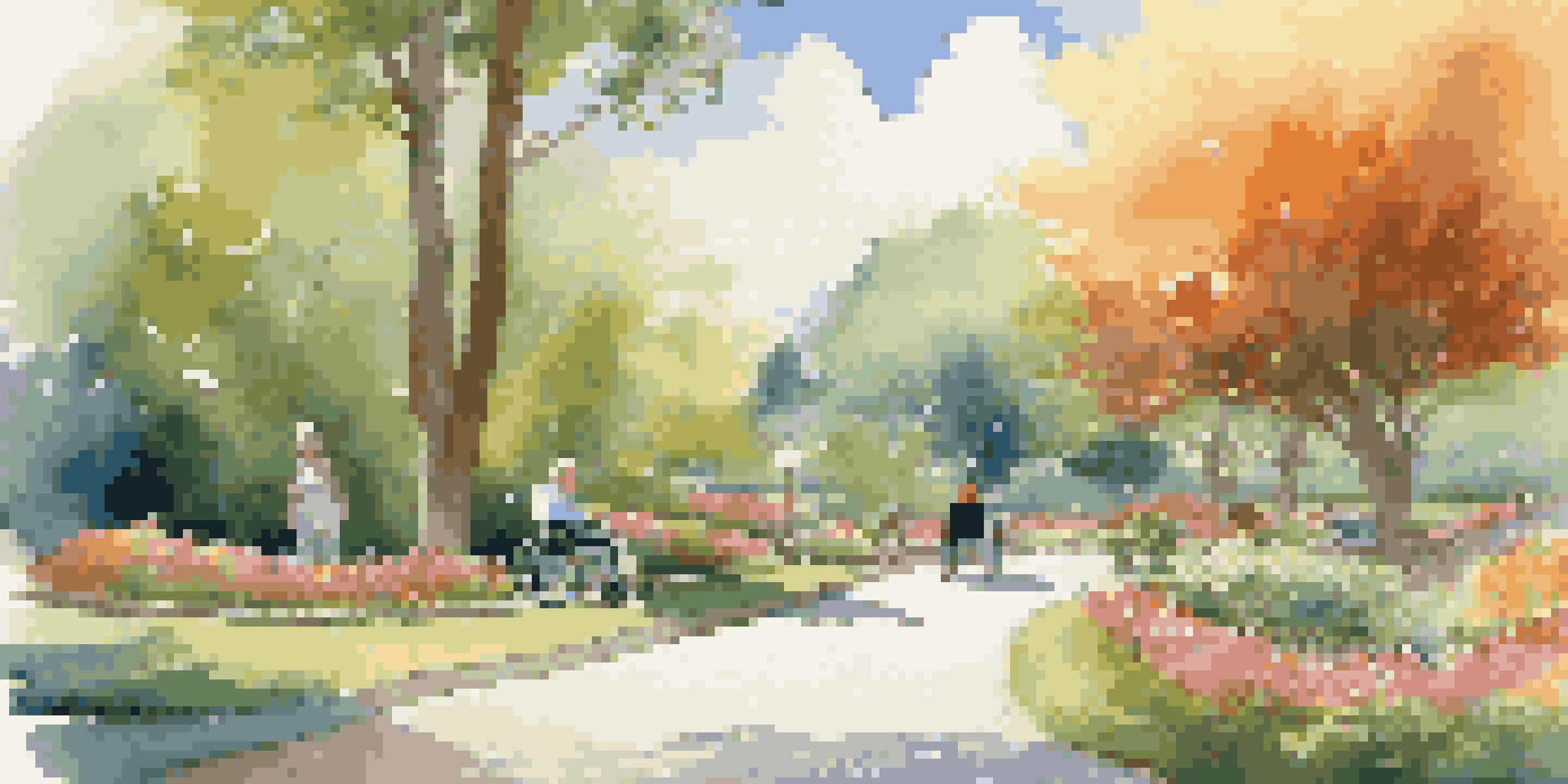 A wheelchair user exploring a beautifully landscaped park with a companion, surrounded by flowers and trees under a bright blue sky.