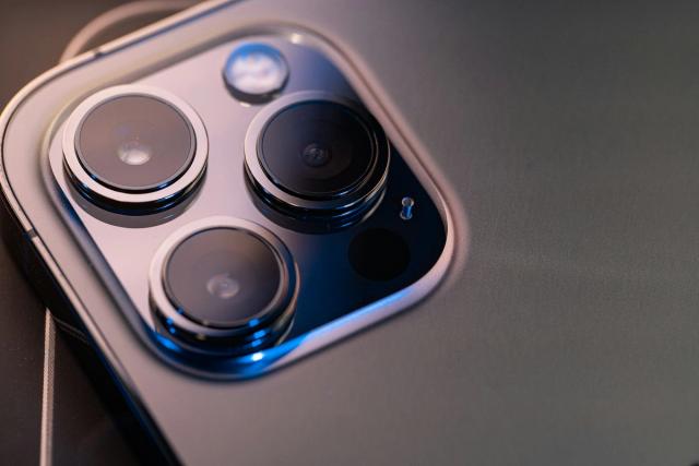 Close-up of the triple rear camera on an iPhone 12 Pro Max.