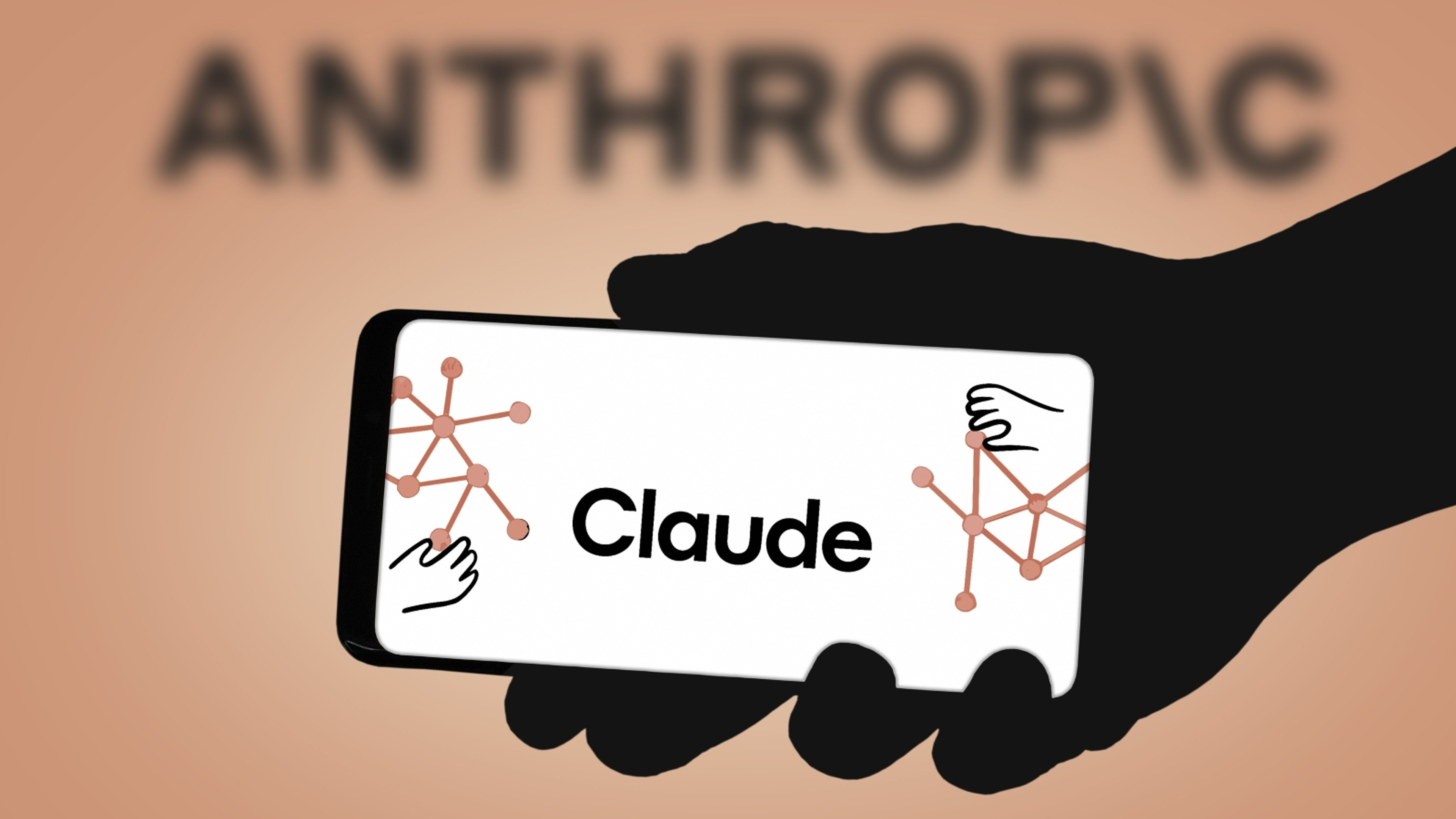 Claude AI app displayed on a smartphone held by a silhouetted hand, with the Anthropic wordmark blurred in the background.