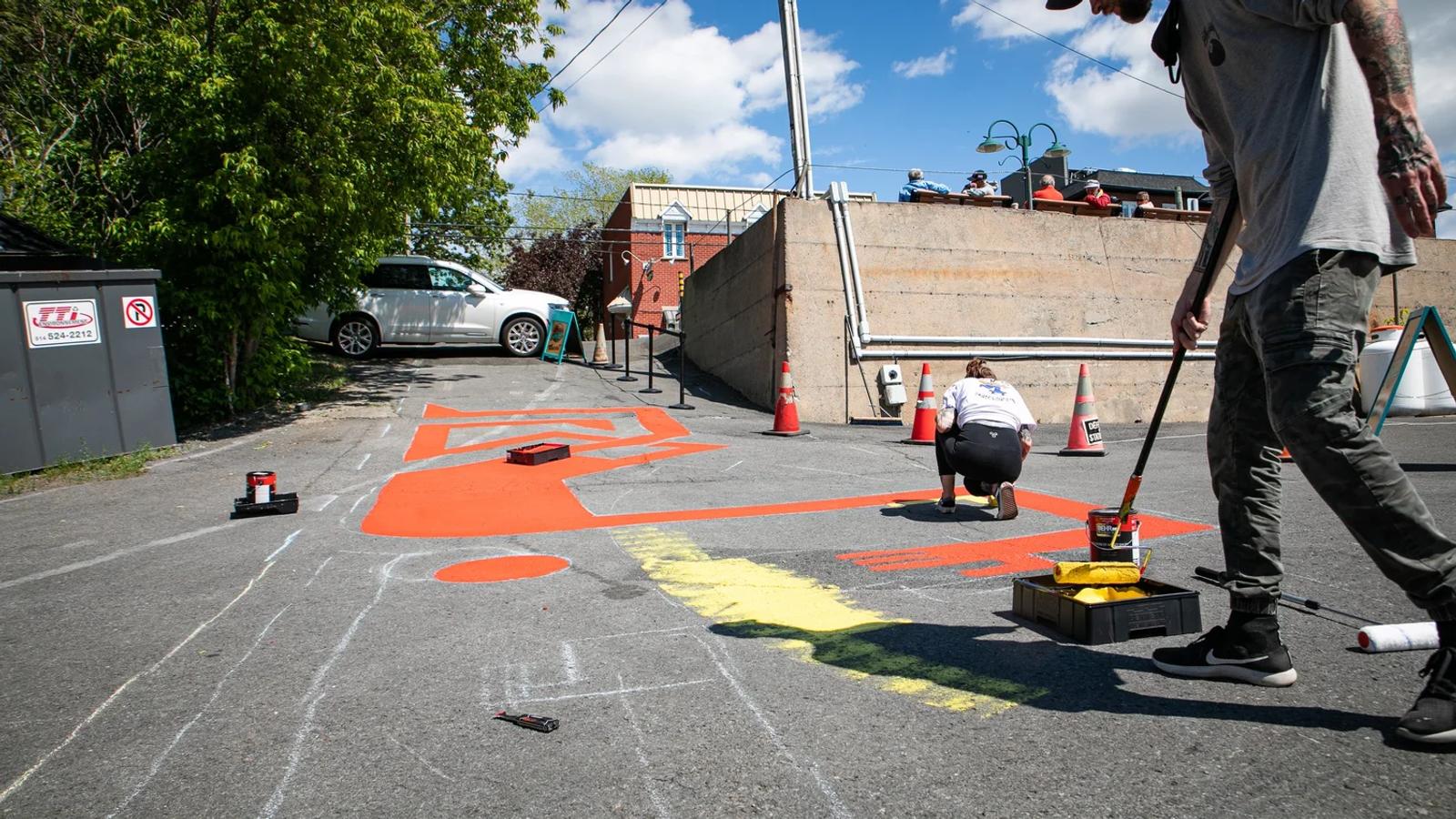 The marina crew rolling saturated color across the parking lot surface, Boucherville 2021