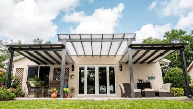 Aluminum pergola and patio cover over a South Florida backyard patio