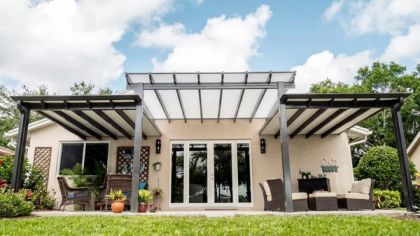 Aluminum pergola and patio cover over a South Florida backyard patio