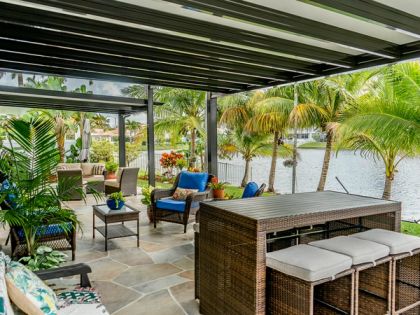 Aluminum pergola in a Boca Raton backyard, Palm Beach County — attached vs. freestanding comparison