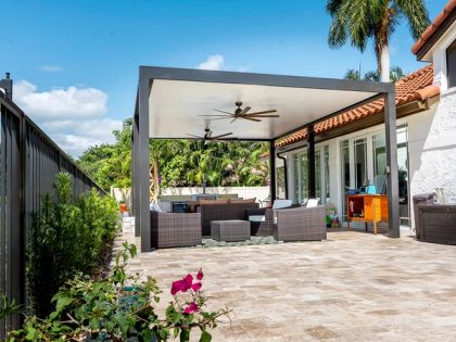 Aluminum patio cover shading outdoor seating in South Florida