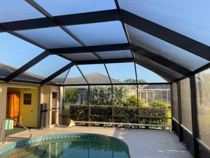 Aluminum pool screen enclosure in Coral Springs, Broward County — pool cage maintenance in South Florida