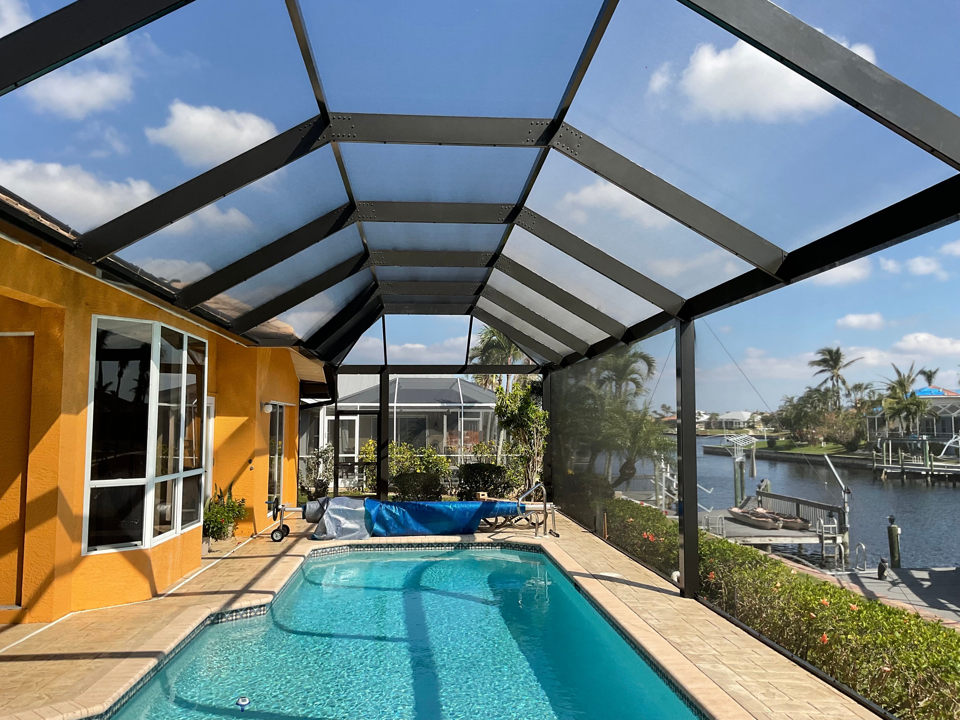 Pool cage with screened entry door South Florida — AB Aluminum & Screens