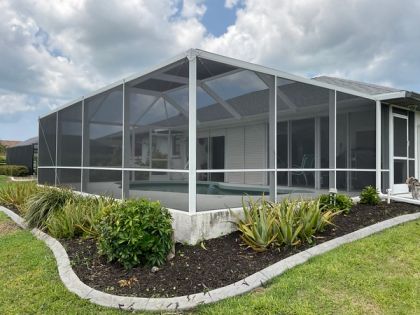Pool screen cage aluminum structure South Florida residential — AB Aluminum & Screens