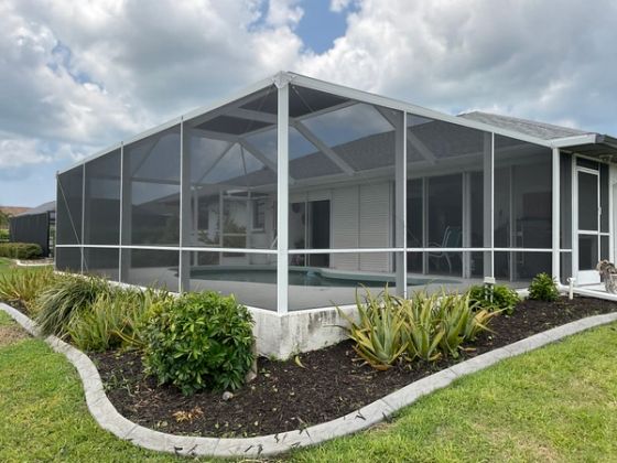 Pool screen cage aluminum structure South Florida residential — AB Aluminum & Screens