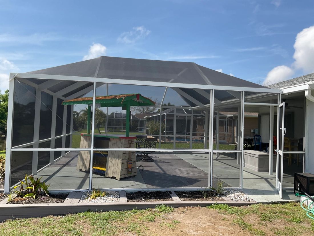 Aluminum pool screen enclosure in Weston, Broward County — when to rescreen or replace a pool cage