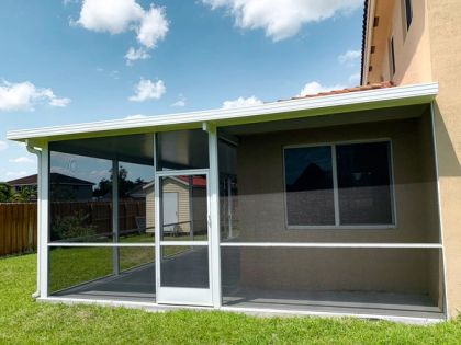 Wrap-around screened porch on a Broward County home