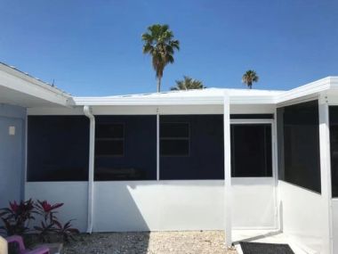 Screened patio enclosure in Coral Gables, Miami-Dade — shade and bug protection in South Florida