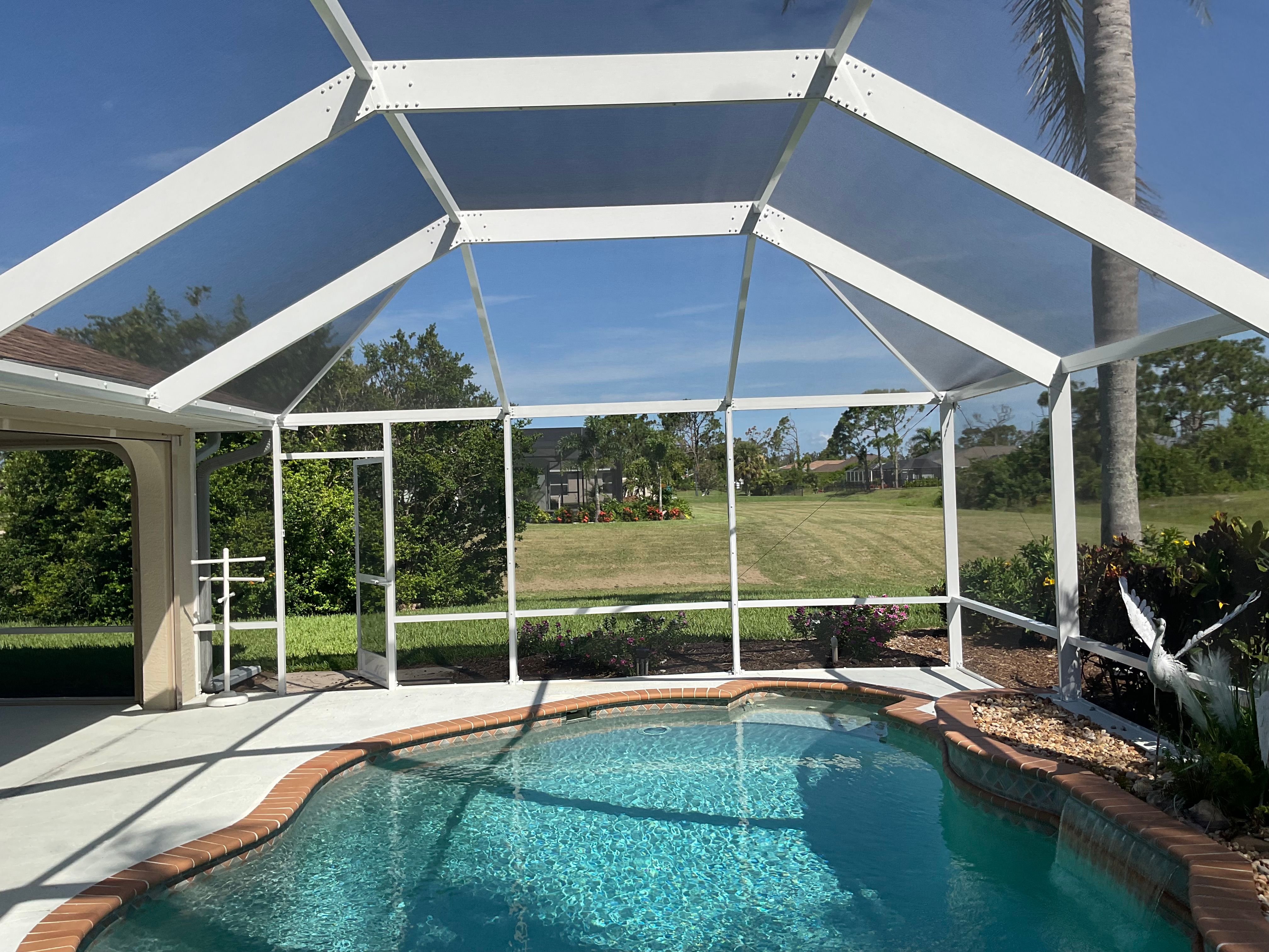 Pool screen enclosure exterior view South Florida home — AB Aluminum & Screens