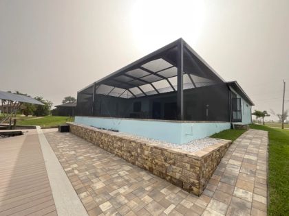 Aluminum pool screen enclosure in Palmetto Bay, Miami-Dade — financing options for South Florida projects