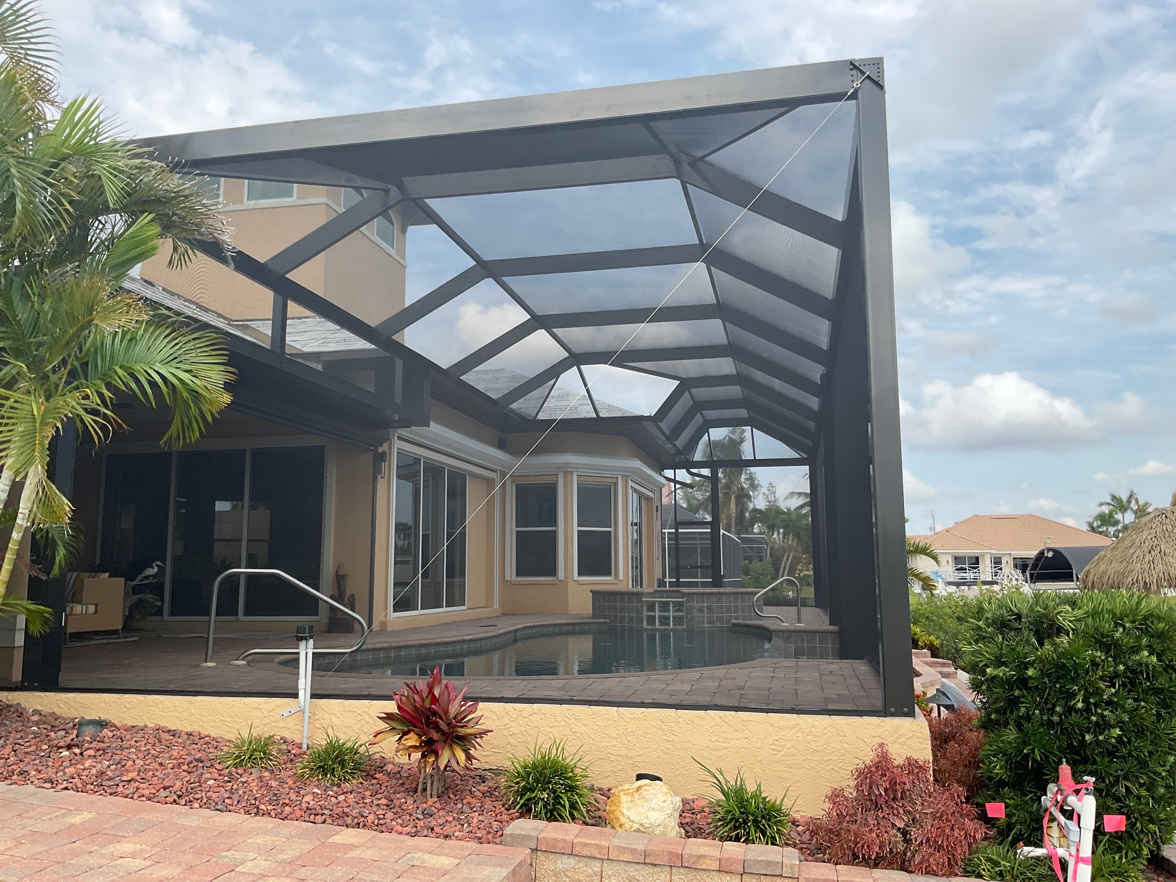 Aluminum pool cage exterior view residential property — AB Aluminum & Screens