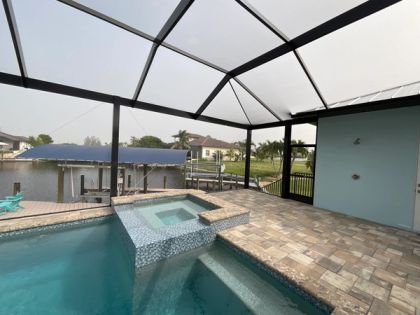 Aluminum pool screen enclosure in Wellington, Palm Beach County — home insurance considerations in Florida