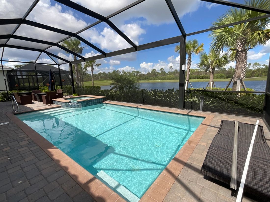 Aluminum pool enclosure in Boca Raton, Palm Beach County — pool enclosure vs. screen room comparison