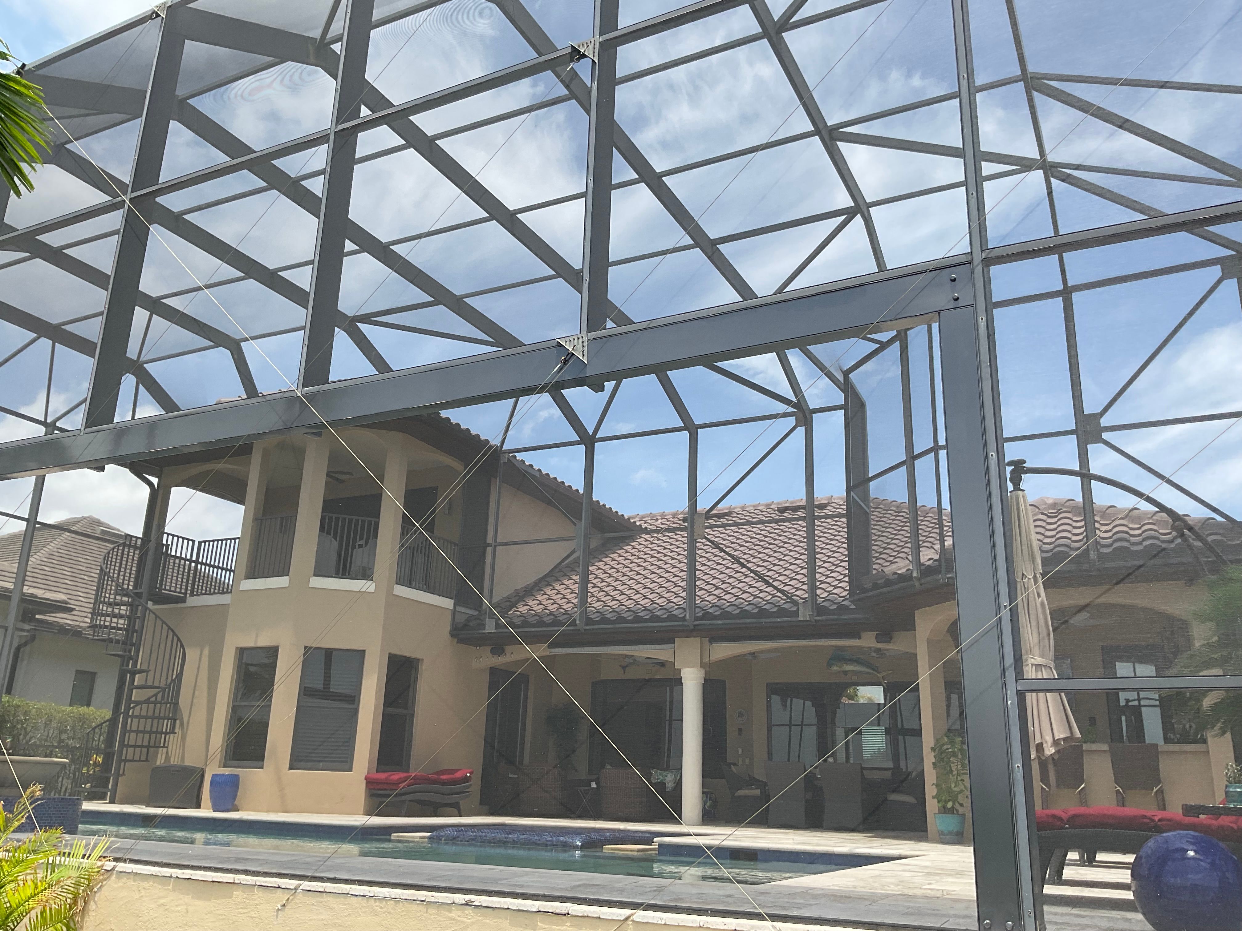 Aluminum pool enclosure with screened walls and roof Miami — AB Aluminum & Screens